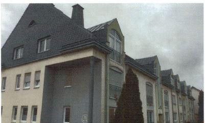 Dachgeschosswohnung mit Weitblick – Außenansicht Gebäude