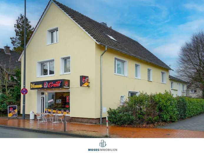 Fully let residential and commercial building (5 residential units + commercial unit) in a central location in Gütersloh – Foto 1