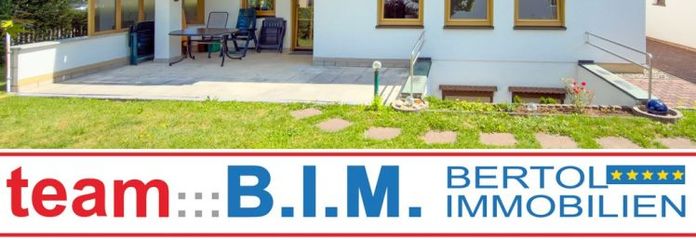 Herrliche Gartenwohnung mit Südloggia | großer Hobby-/Büroraum mit Duschbad | Carport