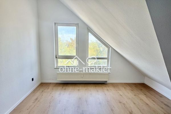 Maisonette di 2 locali con vista sul verde e sul lago, appena ristrutturata, 42 mq, posto auto in garage sotterraneo