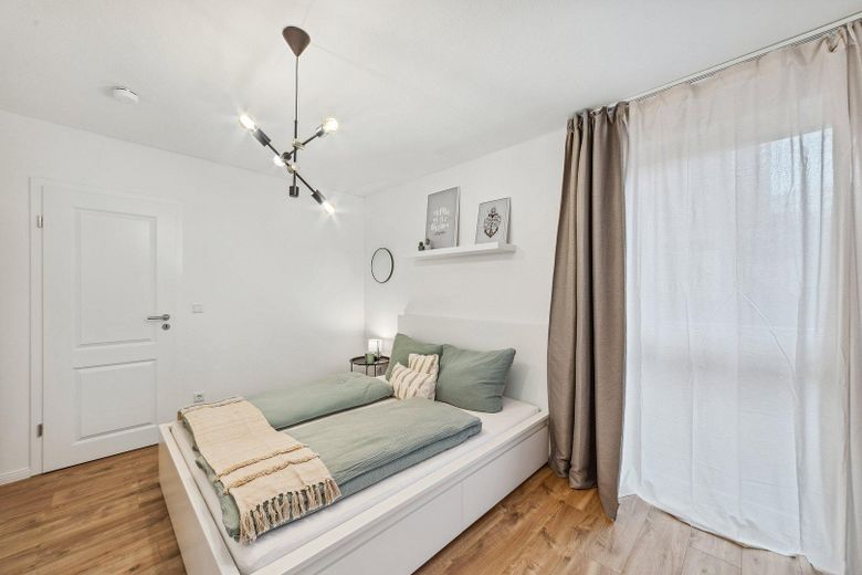 Appartamento esclusivo arredato e ristrutturato, cucina abitabile, balcone e posto auto in garage sotterraneo – Schlafzimmer