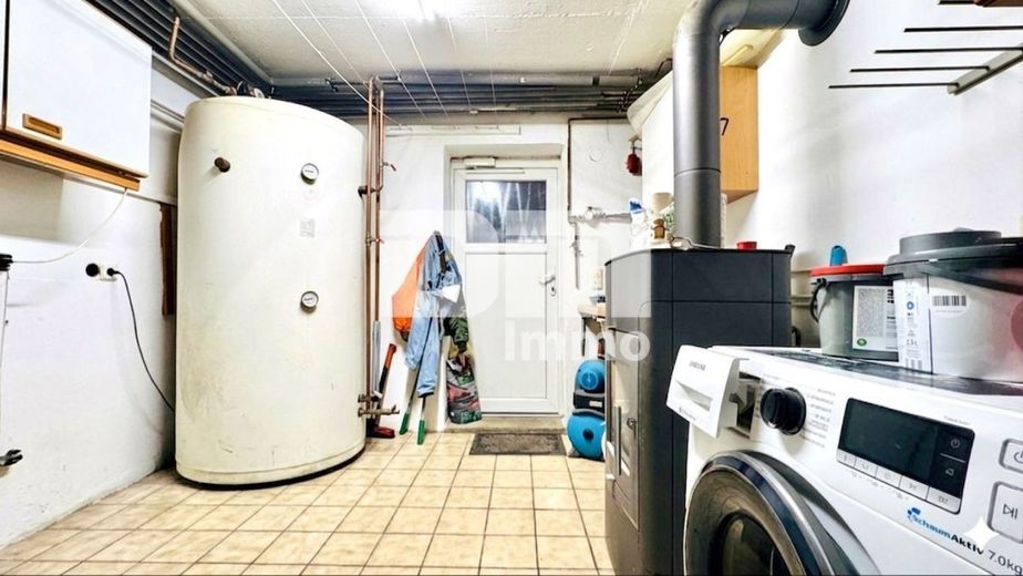 (R)eserviert! Einfamilienhaus am Ortsrand mit großem Grundstück, Carport – EG Waschküche / Kamin Zugang Carport