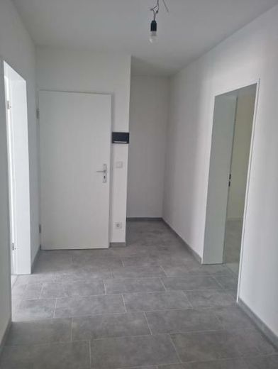 Kernsaniertes 6-Familienhaus mit Wärmepumpe, Garagen und Energieklasse A – Beispiel Wohnung Diele