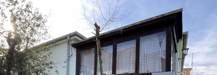 Gemütliches Haus im Bungalowstil auf großem Grundstück