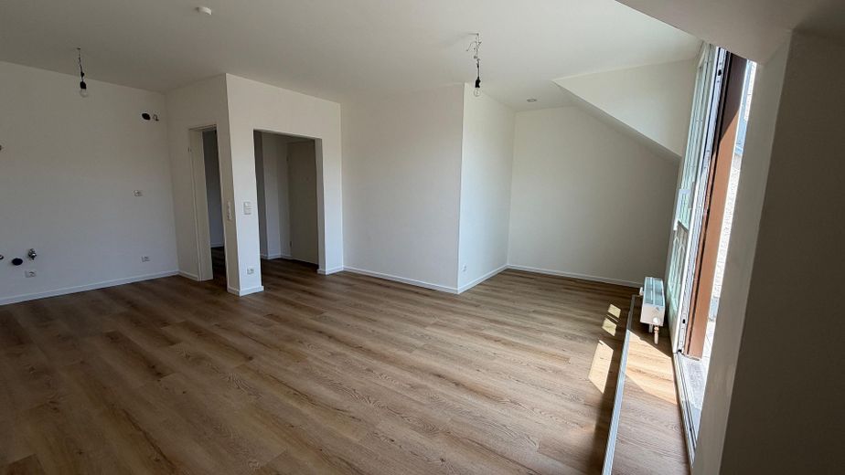 Erstbezug nach Sanierung im Herzen von Unterhaching – Wohnzimmer