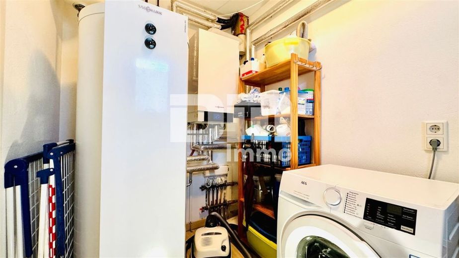Modernes Familienglück nahe KfW 55-Standard mit Terrasse, Carport und Parkplatz – EG HWR / Technik