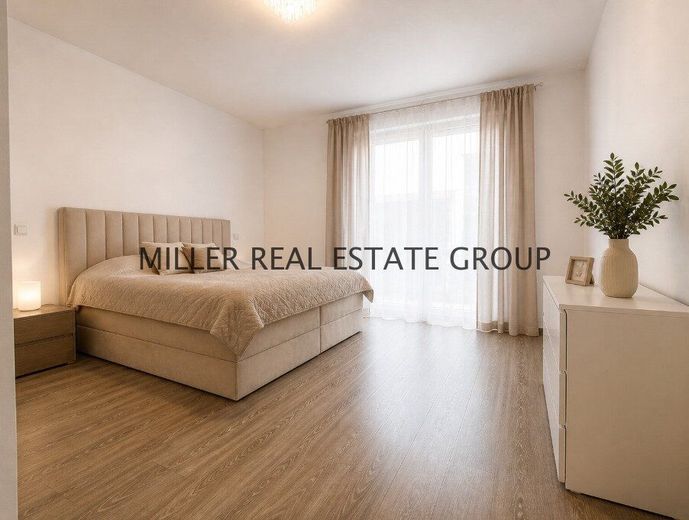 Moderne 4-Zimmer-Erdgeschosswohnung mit Privatgarten, Terrasse &amp; zwei Tiefgaragenstellplätzen! – Schlafzimmer