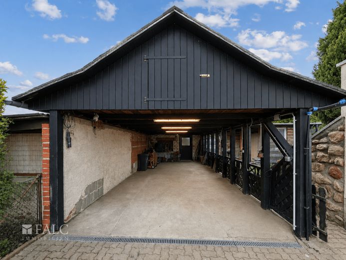 Provisionsfrei! Familienfreundliches Einfamilienhaus in ruhiger Wohnlage – Carport