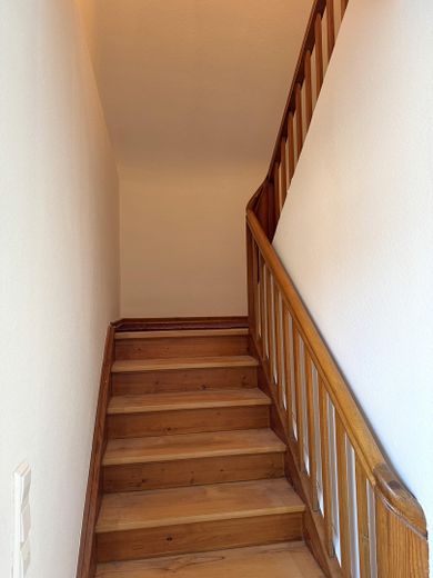 Holztreppenaufgang zum DG