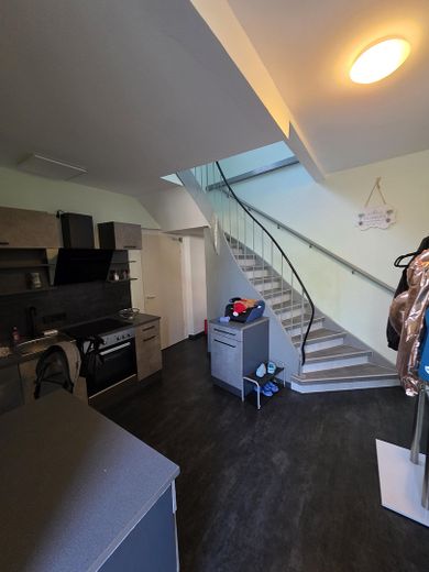 Treppenhaus mit Küche