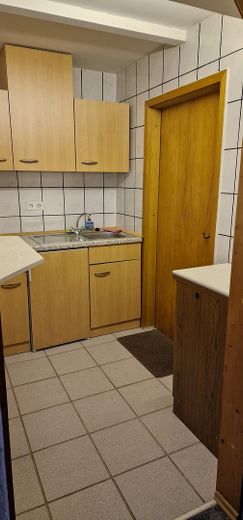 Schönes Freistehendes Haus in Bad Sachsa-Steina – UG Küche mit Tür zur Werkstatt