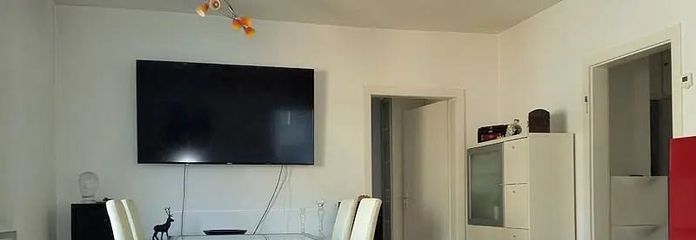 Appartement lumineux avec terrasse et vue sur la cathédrale, situé au centre – Wohnzimmer2
