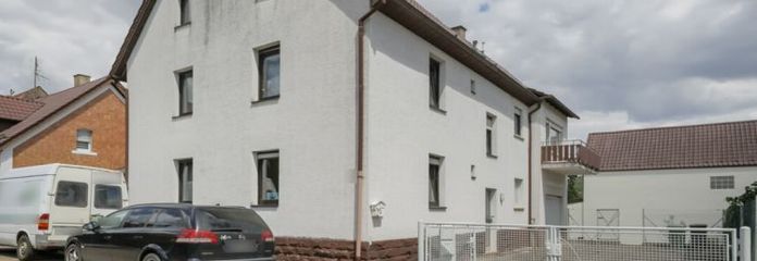 Zweifamilienhaus mit Garten und Süd-Balkon – sanierungsbedürftig mit Potenzial!