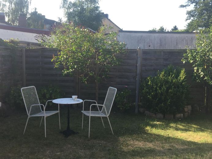 SENZA PROVVIGIONE Casa trifamiliare con vista sul fiordo e interessanti redditi da locazione, circa 300 m2 di superficie abitabile – EG-Wohnung Garten