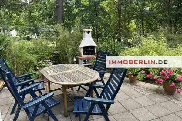 IMMOBERLIN.DE - Toplage! Großzügige Wohnung mit Südwestterrasse, Wintergarten, Kamin & Garten