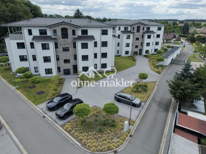 Moderne 4-Zimmer-EG-Wohnung mit überdachter Terrasse, Aufzug & Wärmepumpe – Foto 1