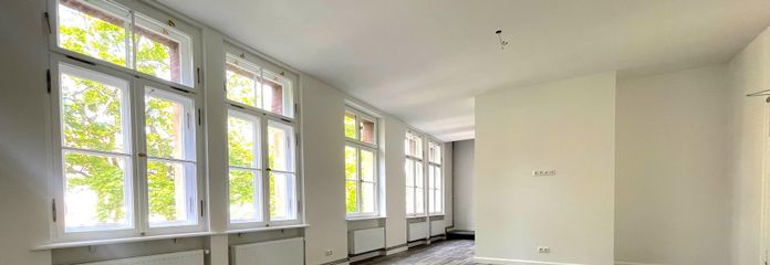 Erstbezug: Maisonette-Wohnung mit Loft-Charakter und großem Garten – Wohnbereich