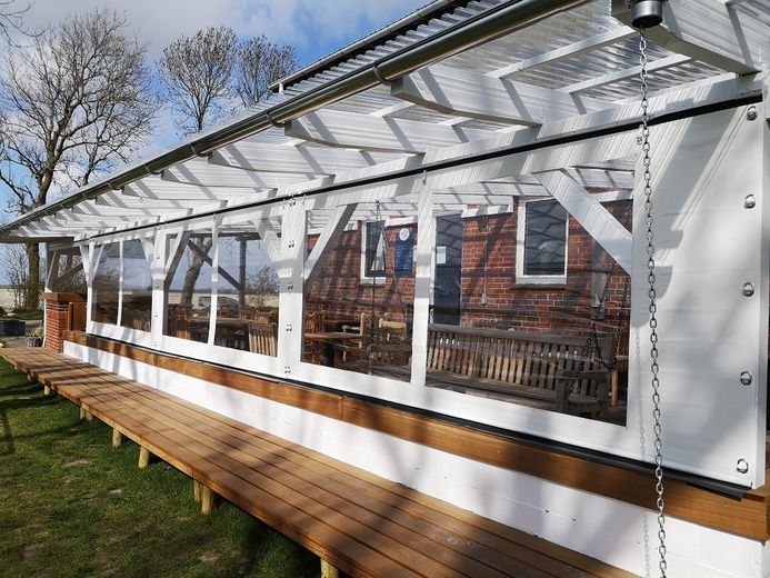 Traumhafter Resthof in absoluter Alleinlage direkt hinterm Eiderdeich mit eigenem Leuchtturm! – Wintergarten / Terrasse
