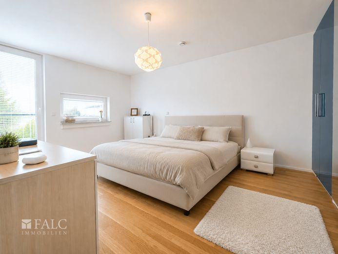 Urbanes Wohnen mit Skylineblick - modernes Wohnen am Frankfurter Riedberg – Schlafzimmer (KI)