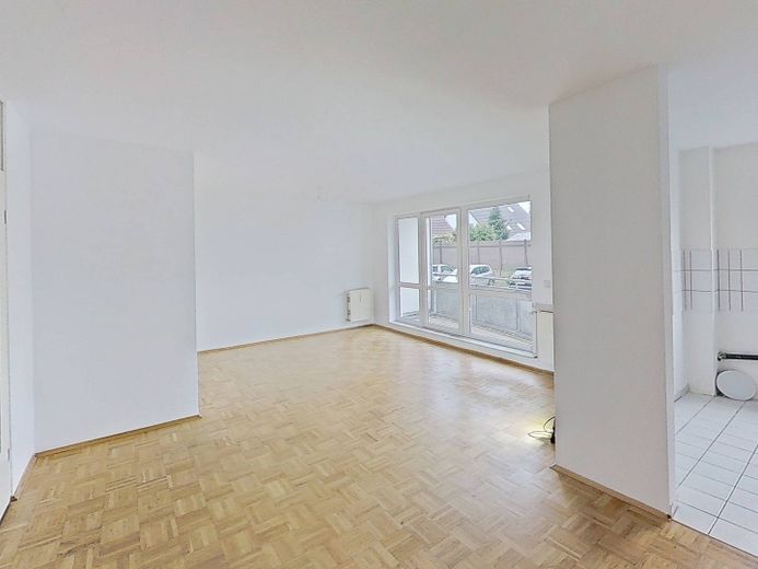 Moderne 3-Zimmer-Wohnung im Wohnpark Biestow – Ansicht IV: Wohnzimmer mit Zu…