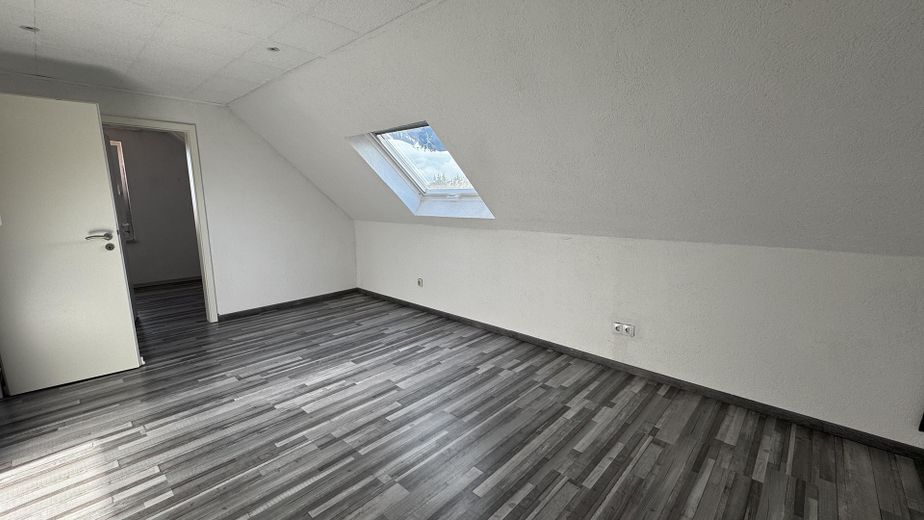 Gepflegtes Mehrfamilienhaus mit drei Wohneinheiten – Foto 4