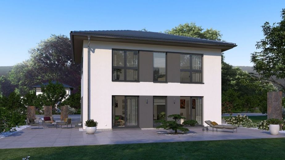 MODERNES WOHNHAUS MIT ELEGANTEM WALMDACH – Ansicht Garten