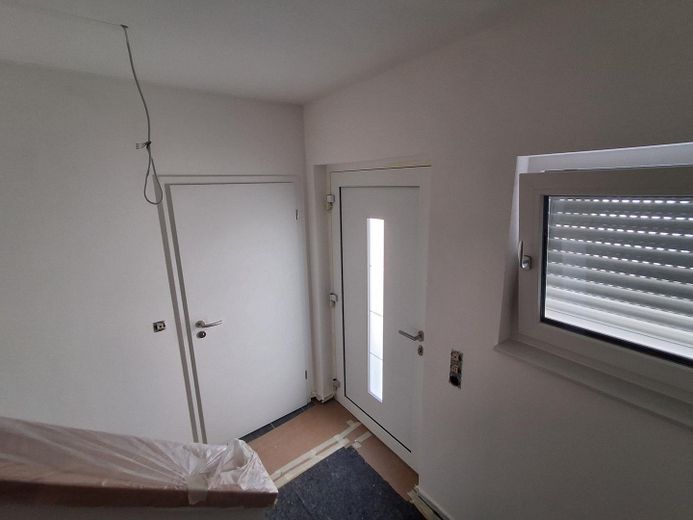 Schönes Einfamilienhaus mit Einlieferwohung – Flur EG