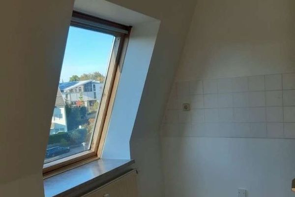 Abitare in tranquillità, vivere in centro: moderno appartamento mansardato con pianta flessibile