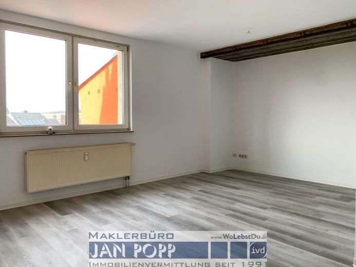 Gemütliche 3-Zimmer-Dachgeschosswohnung in zentrumsnaher Lage – Foto 1