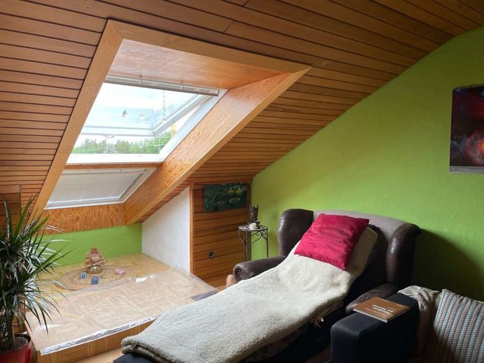 Gemütliche Dachgeschosswohnung mit Seesicht – Gemütliches Wohnzimmer