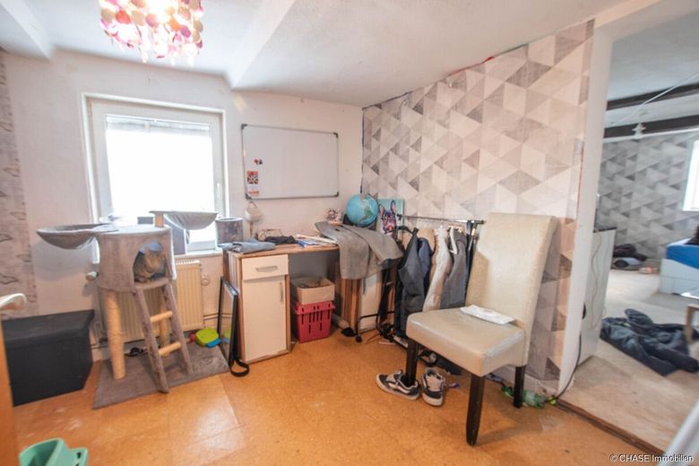 2x Einfamilienhäuser mit Entwicklungspotenzial - Teilvermietete Kapitalanlage in Rollshausen! – Haus 1 Kinderzimmer OG
