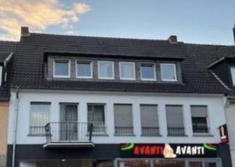 Mehrfamilienhaus mit Gewerbe