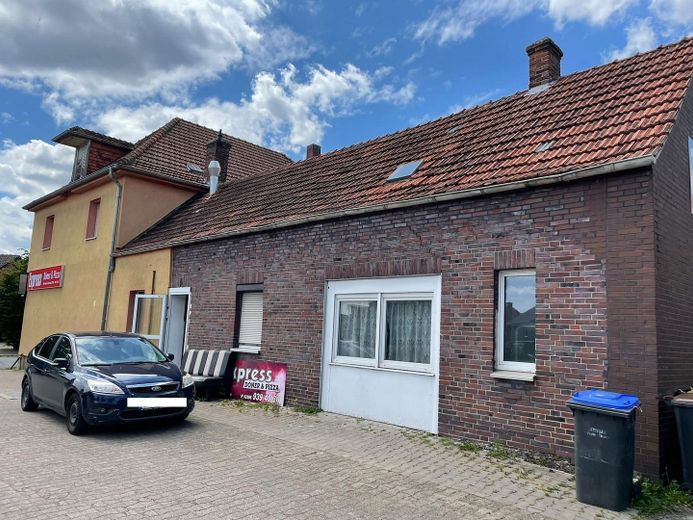 Wohn- und Geschäftshaus mit Ladenfläche, Nebengebäude, Garagen&Ausbaupotenzial in Nordkirchen-VHB – Haus Seitenansicht