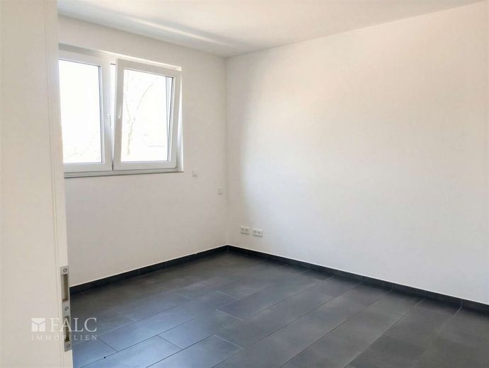Einziehen &amp; wohlfühlen: Moderne Wohnung mit Balkon und energetischen Bestwerten in Laggenbeck – Schlafzimmer