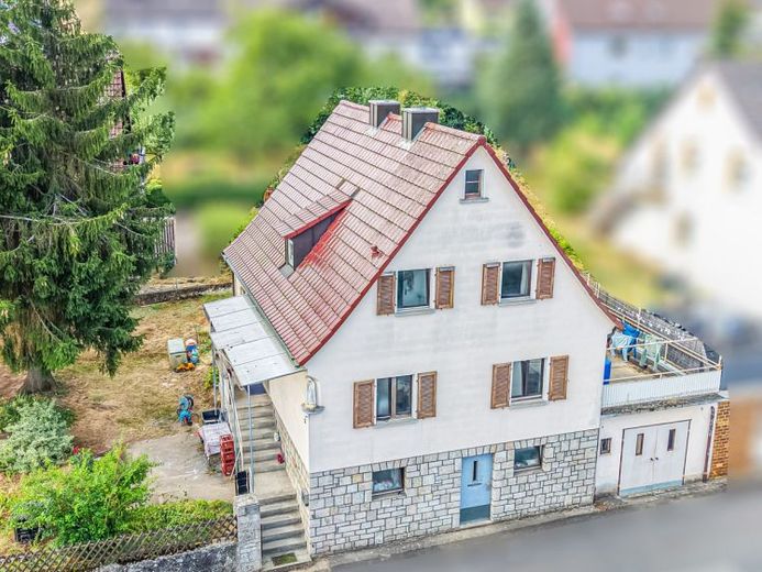 Affascinante casa unifamiliare con ampio terreno, anno di costruzione 1955 – Ideale per famiglie con bambini! – Foto 1