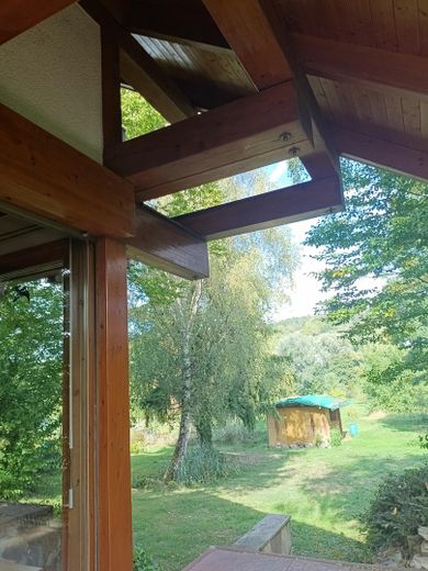 Einzigartiges Holzhaus im Grünen in Randlage und doch zentral – Foto 26