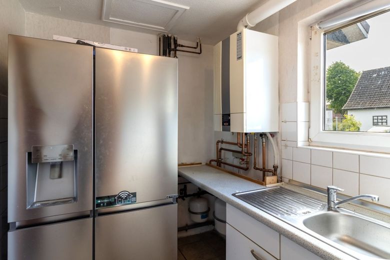 Einfamilienhaus mit viel Potenzial und Raum für eigene Ideen – Hauswirtschaftsraum