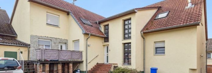 Attraktives Mehrfamilienhaus mit 6 Einheiten, PV-Anlage & großem Entwicklungspotenzial