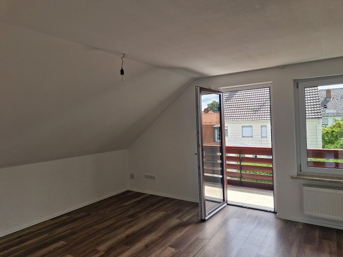 Attic apartment with south-facing balcony – Wohnzimmer