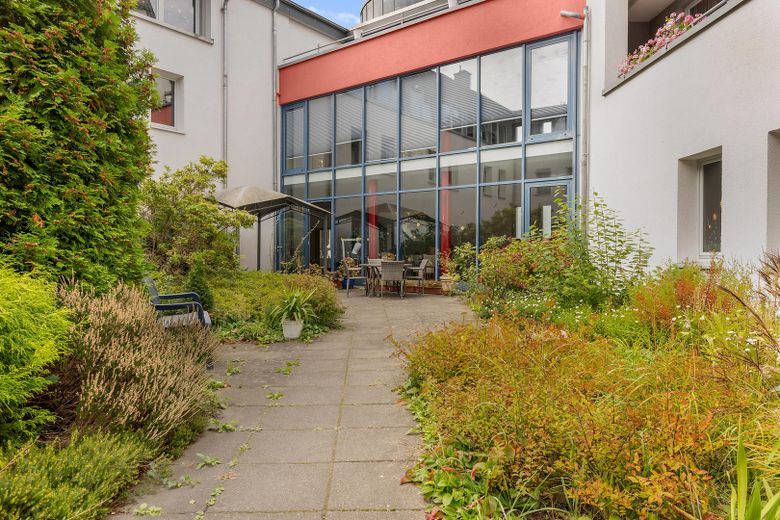 Zorgappartement als belegging: 5,92 % nettohuurrendement, huurcontract tot 2040, geen leegstandsrisico – Eingang