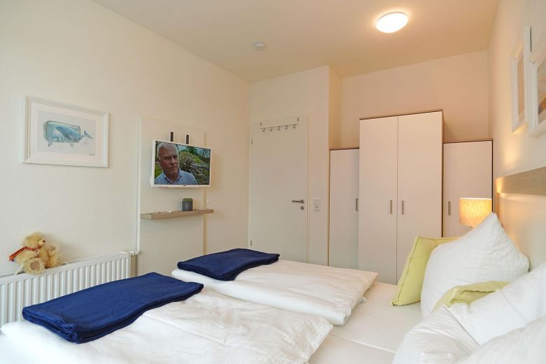 Стильна квартира для відпочинку «на Балтійському морі" – Schlafzimmer mit Doppelbett