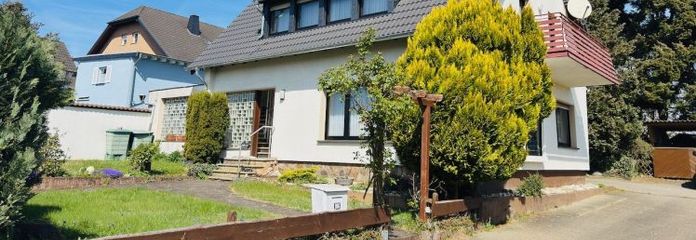 Freist. Einfamilienhaus mit Garage und Garten in zentraler Lage!