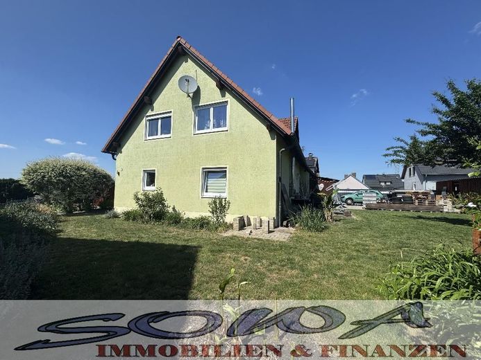 Charmantes Einfamilienhaus mit großem Garten, Garage und viel Platz für die ganze Familie - Ein Objekt von Ihrem Immobilienpartner SOWA Immobilien und Finanzen – Bild 2