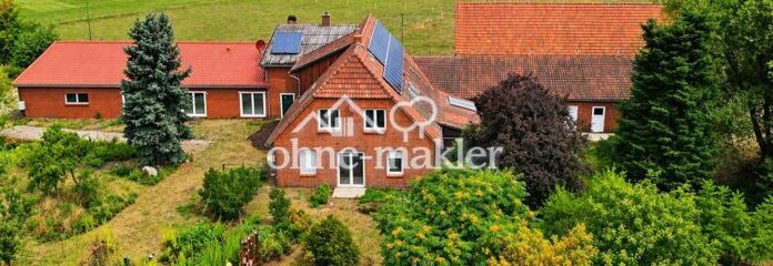 Ancienne ferme avec 378 m² habitables, 670 m² de surface utile et 2 logements