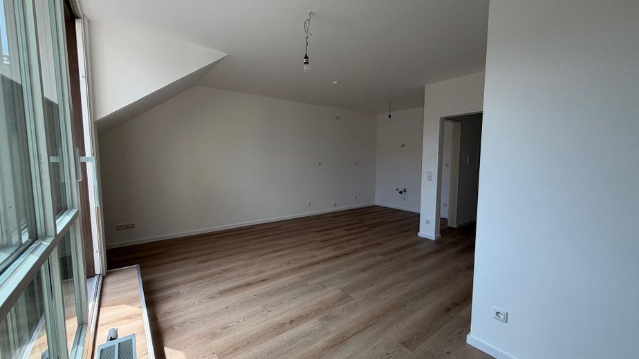 Erstbezug nach Sanierung im Herzen von Unterhaching – Wohnzimmer