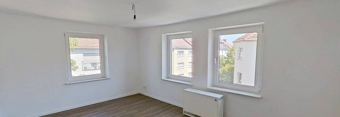 Bright 3-room apartment close to the city centre in Nürnberg-Steinbühl – Ansicht I: Wohn- und Esszimmer