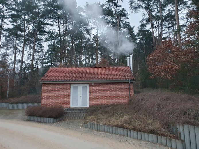 Ferienhaus mit eigenem Bootssteg im Hafendorf Rheinsberg – Heizwerk im Hafendorf