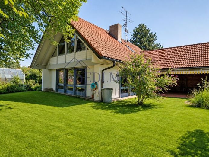 VERKAUF: Wohngefühl der Extraklasse – Einfamilienhaus mit offenem Wohnkonzept und großem Garten! – Foto 1
