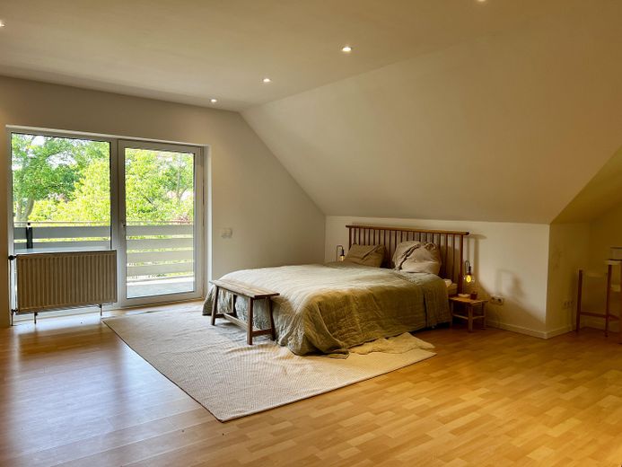 Schlafzimmer mit Balkon