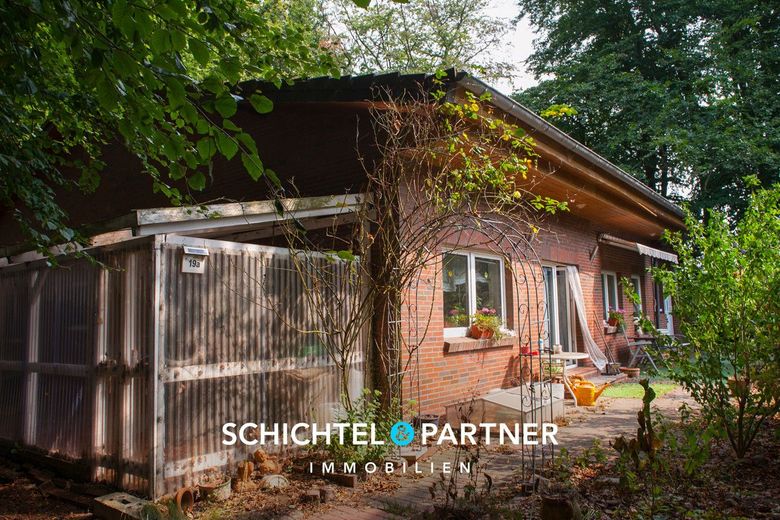 Farge | Solider Bungalow auf Waldgrundstück mit Doppelgarage – S&amp;P | Außenansicht